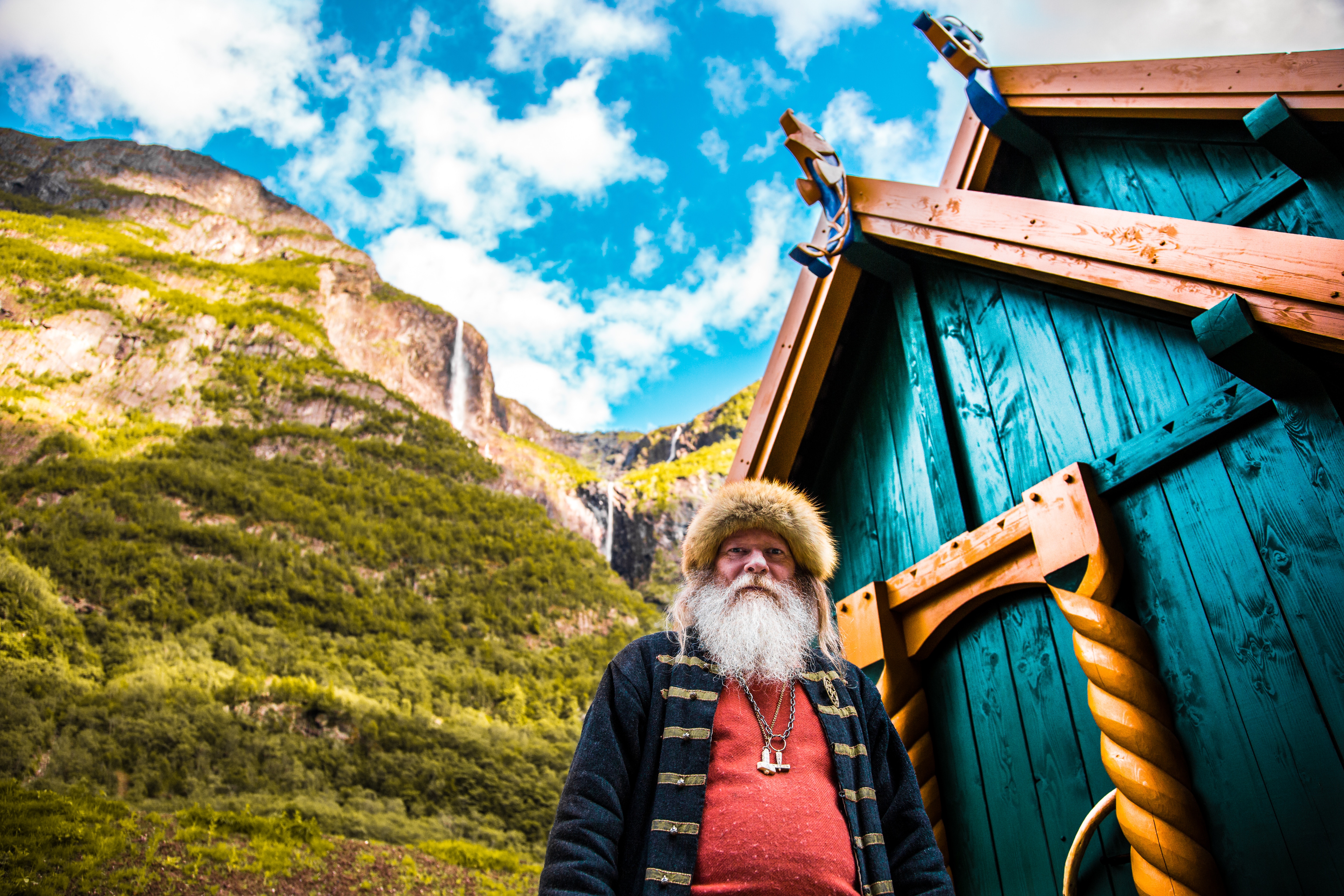 A viking in front of his home